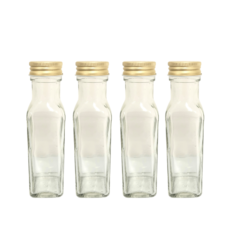 4x Glasflasche 100ml mit goldfarbenem Schraubverschluss von Ohne Marke bei Araxxon - Hochwertiges griechisches Produkt. 4x Glasflasche 100ml mit goldfarbenem Schraubverschluss από Ohne Marke στο Araxxon - Αυθεντικό ελληνικό προϊόν.